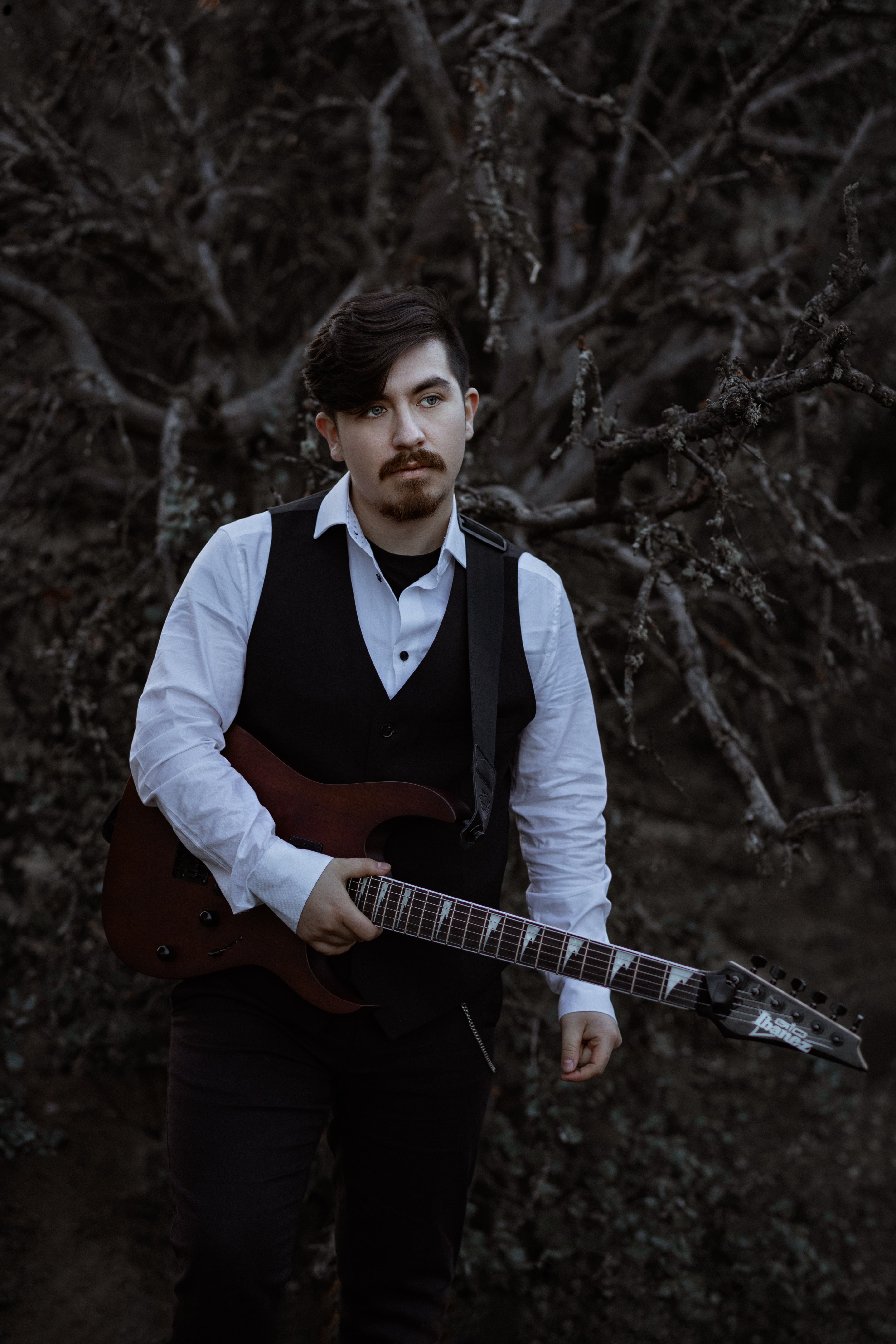 Portrait of Metalnonsense of Chronist with his Ibanez guitar